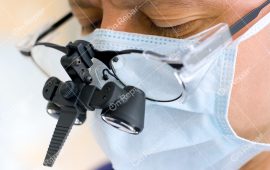 9583615 - look of working surgeon with binocular glasses